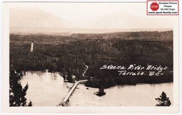 skeena_river_bridge_taken_from_mountain_during_flood_probably_ca_1936_notice_road_end_of_bridge_went_on_queensway_only_not_straight_thru_as_today_marked.jpg