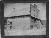 Photo of an old building with Souris Coal Mining company Ltd. logo painted on the side