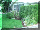 Front of our house, with a new flower garden in the middle front