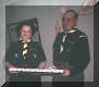 Mom and Dad receiving their silver plate and boquet of roses when they resigned from being Cub Leaders